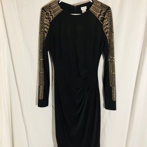 Stunning black and gold long sleeve dress